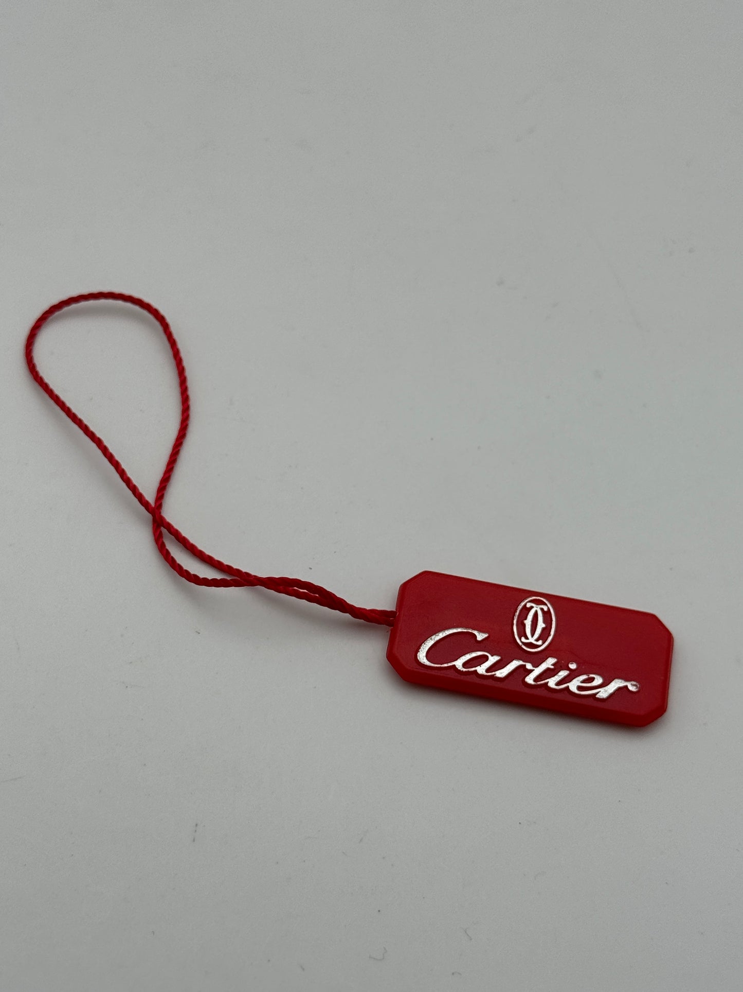 Cartier tag cartellino red