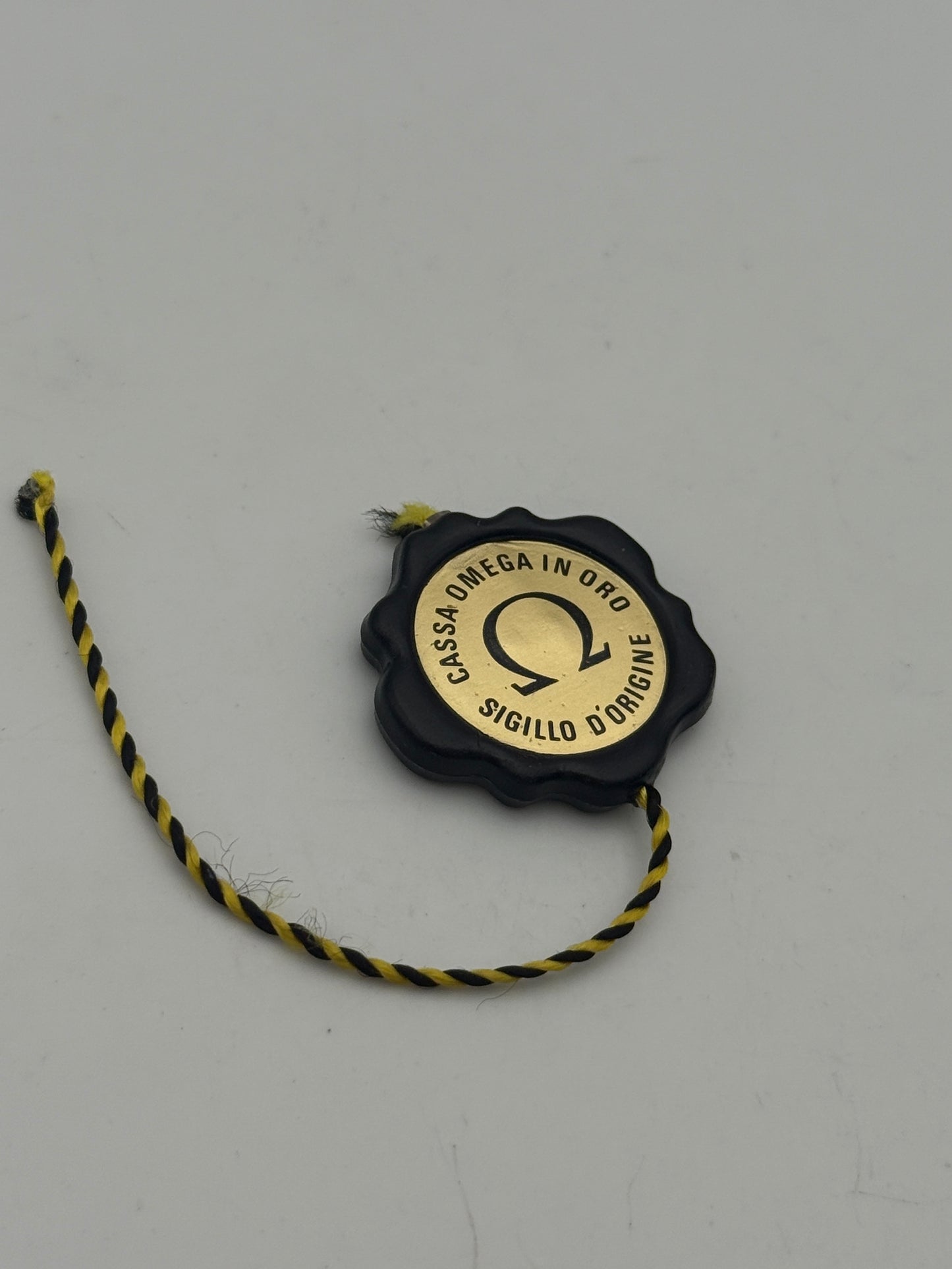 omega tag cartellino sigillo d'origine vintage