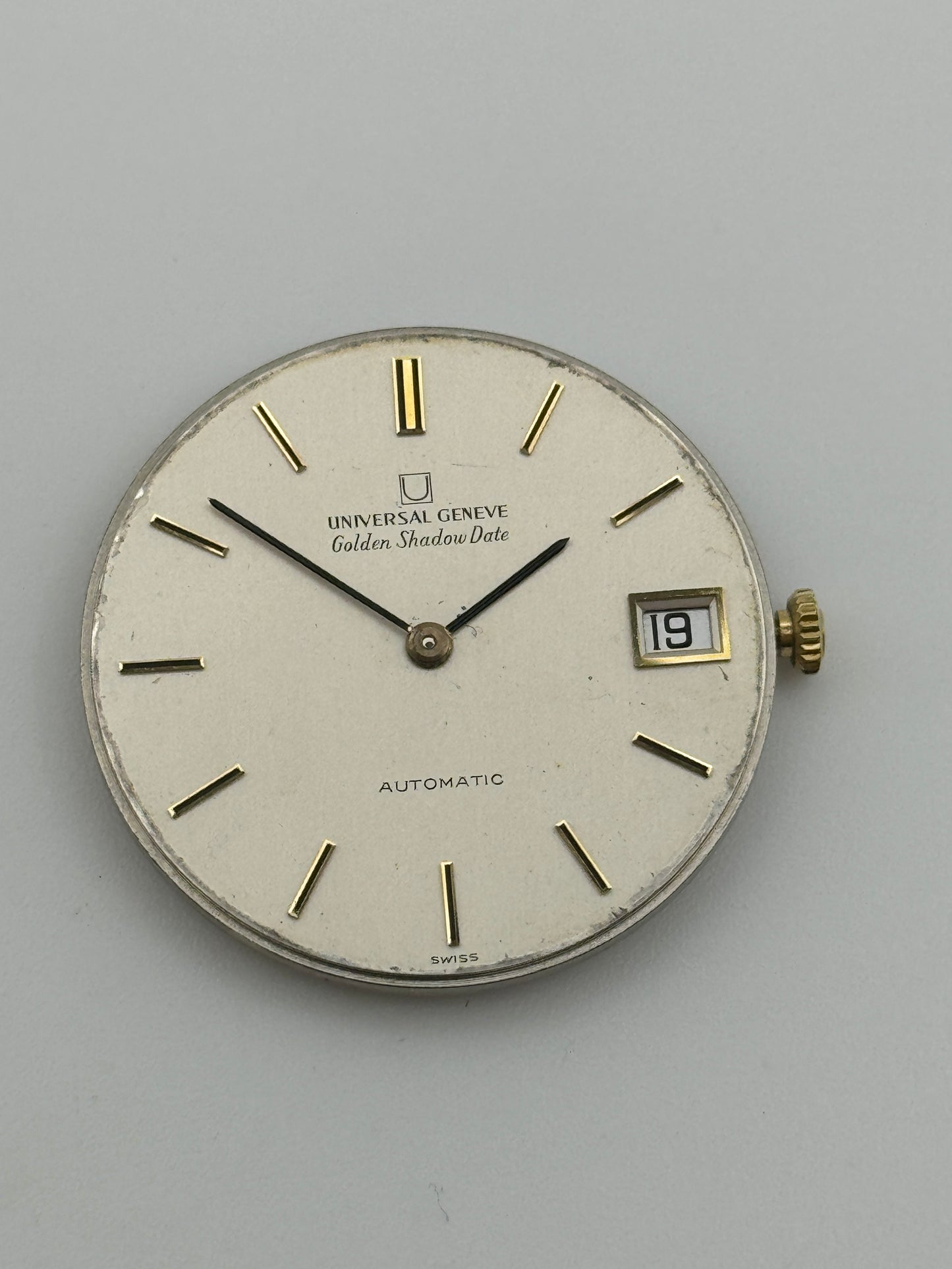 Universal Genève golden shadow date automatic microrotor 2-67 movement movimento